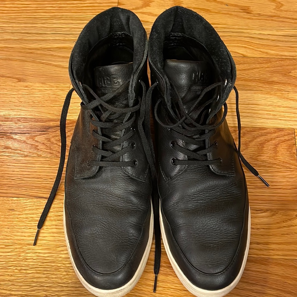 CLAE Mens black leather high top sneaker.